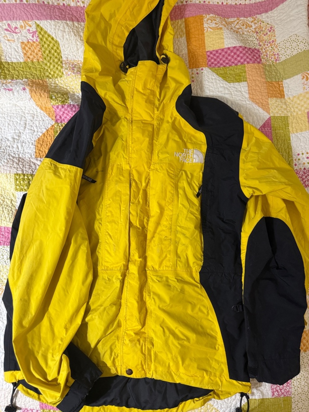 The North Face Yellow and Black Hooded Shell Jacket